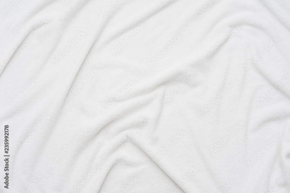 Obraz premium white crumpled blanket, plaid, top view