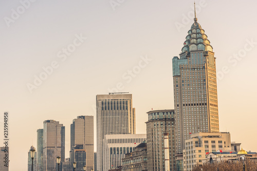 Modern skyscrapers of Shanghai at sunset, China