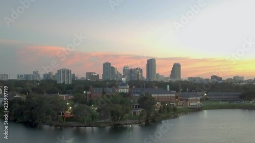 122. Downtown Orlando Golden hour Aerial dolly in revealing