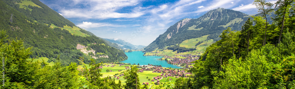 Lungernersee with Swiss Alps. Lungernersee is a natural lake in Obwalden, Switzerland, Europe