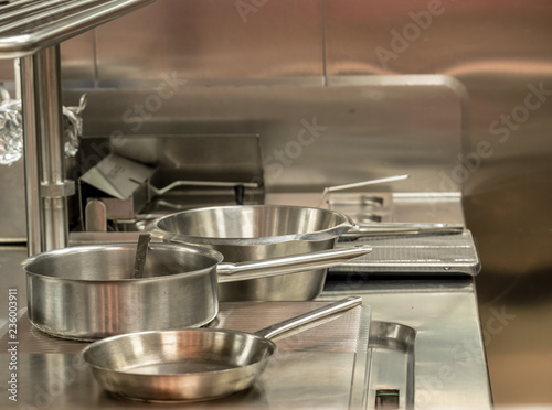 Fototapeta Modern stainless steel hobs in commercial kitchen