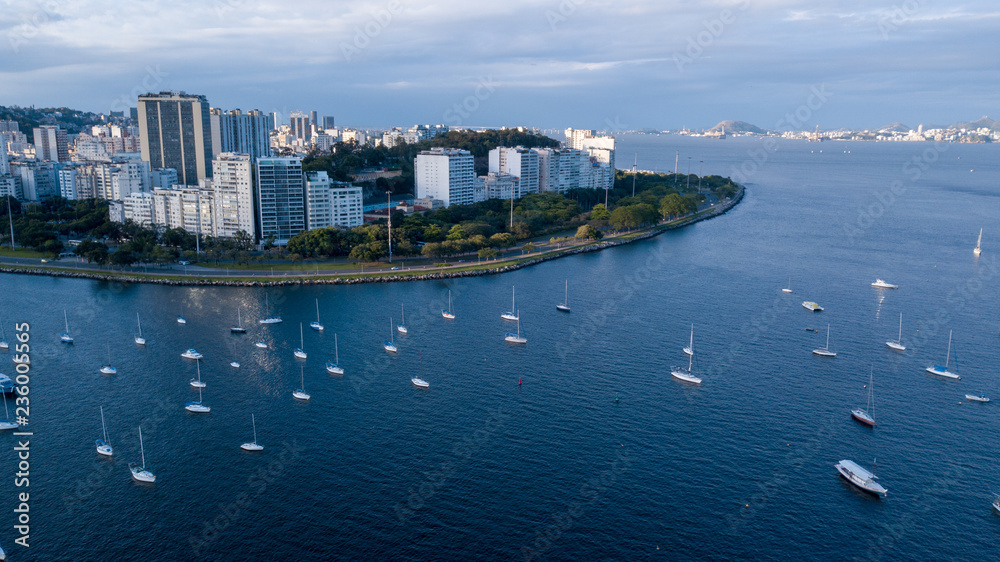 Aerial view on the drone cove of Botafogo in Rio de Janeiro, sea and boats in the late afternoon