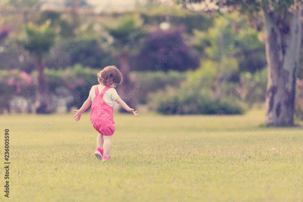 little girl spending time at backyard little girl spending time at backyard