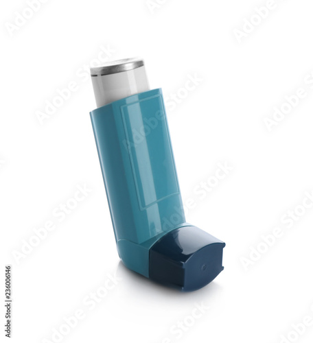 Portable asthma inhaler device on white background photo