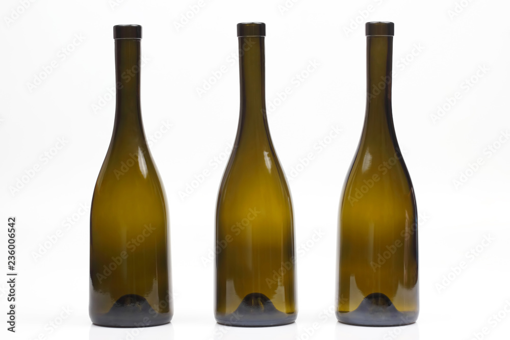 Three empty wine bottles on white background Three empty wine bottles on white background