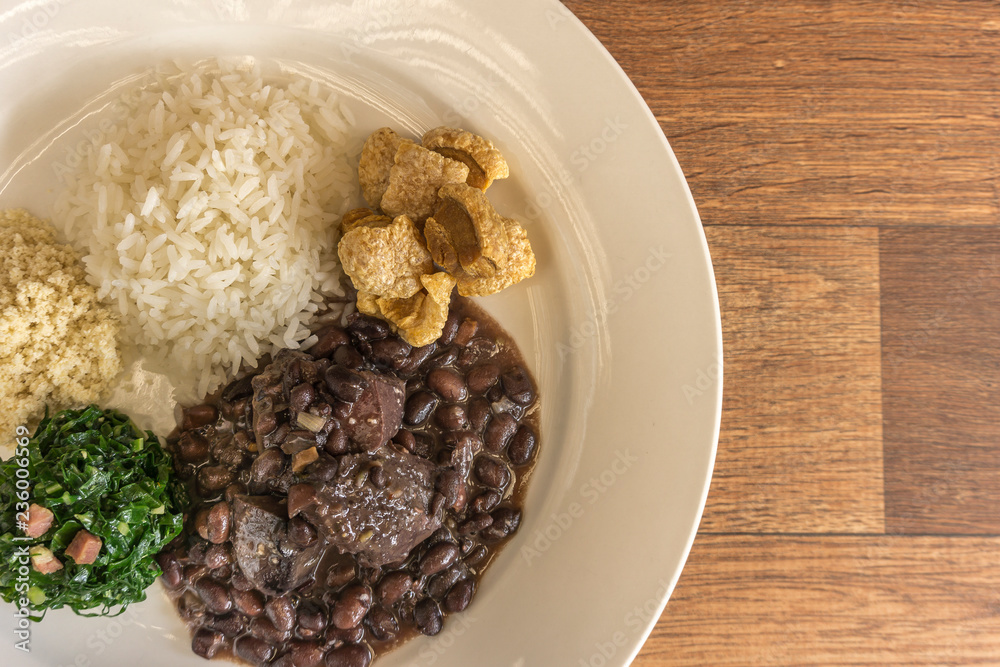 White dish with ingredients of feijoada, typical food of Brazil White dish with ingredients of feijoada, typical food of Brazil