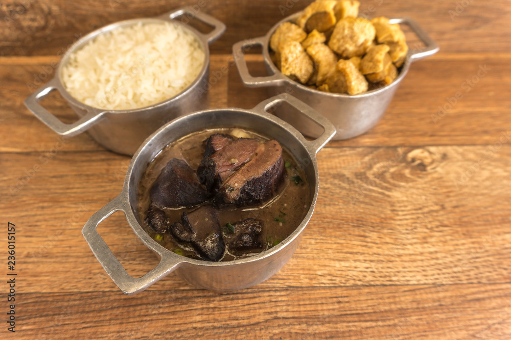 Ingredients of feijoada, typical food of Brazil