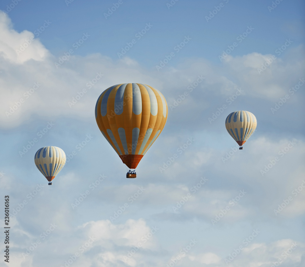 Fototapeta premium Three air balloons flying in the sky