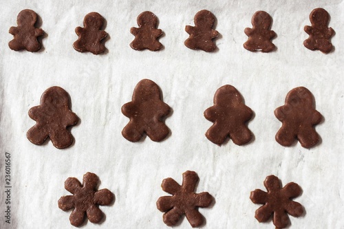 Gingerbread man cookies cut outs ready to bake /Christmas baking concept
