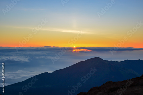 Sunrise at the summit of Haleakala volcano on the island of Maui, Hawaii. © Mosto