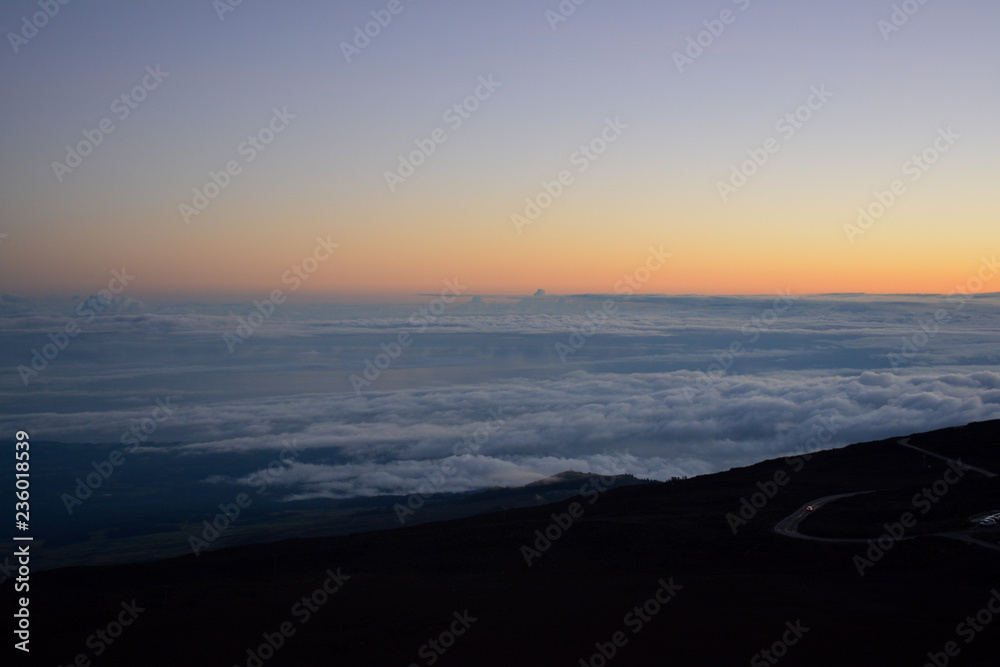 Sunrise at the summit of Haleakala volcano on the island of Maui, Hawaii.