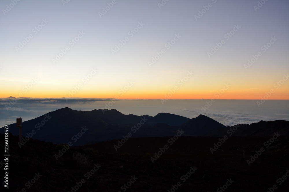 Sunrise at the summit of Haleakala volcano on the island of Maui, Hawaii. Sunrise at the summit of Haleakala volcano on the island of Maui, Hawaii.