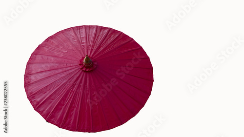 Red umbrella umbrella made of fabric with a white background.