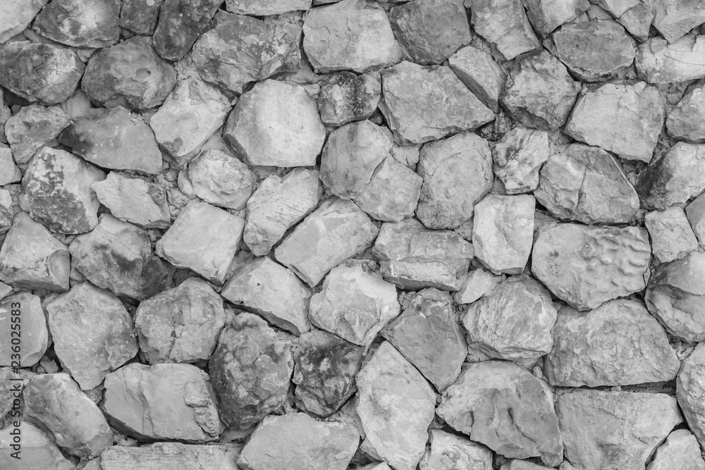 Seamless White pattern of decorative gray slate stone wall surface of modern style design decorative uneven cracked realmasonry wall of multicolored stones or blocks with cement or sandstone. Seamless White pattern of decorative gray slate stone wall surface of modern style design decorative uneven cracked realmasonry wall of multicolored stones or blocks with cement or sandstone.