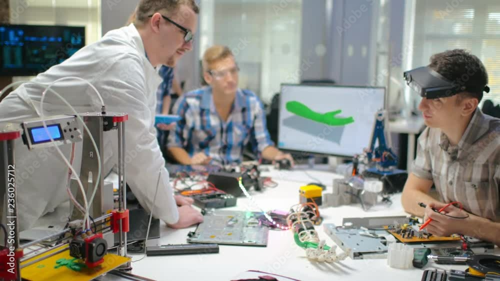 Group of talented engineers simulating materials Group of talented engineers simulating materials