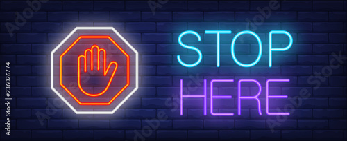 Stop here neon text with palm in octagon sign. Caution design. Night bright neon sign, colorful billboard, light banner. Vector illustration in neon style.