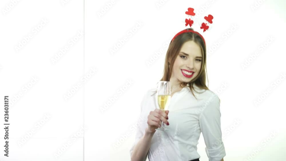 4К. Businesswoman in red Santa hat with glass of champagne dance .Christmas Day