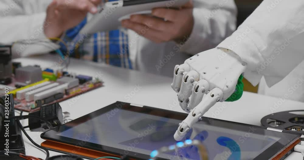 Robotic arm turning 3d model on ipad. Robotic arm turning 3d model on ipad.