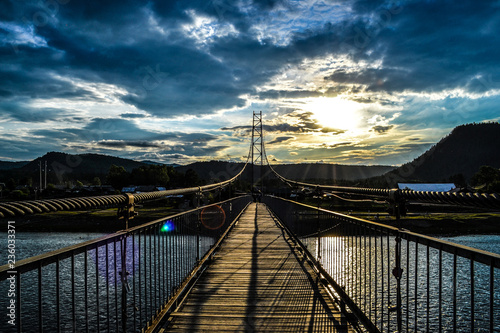 sunset over the bridge over the river