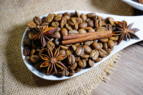 Fototapeta Naklejka Na Ścianę i Meble -  Aromatic coffee in beans and spices and chocolate
