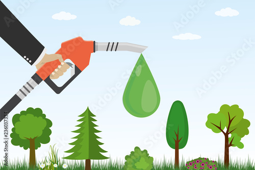 Gasoline pump with drop and green plants, grass,trees..Ecological gas station.