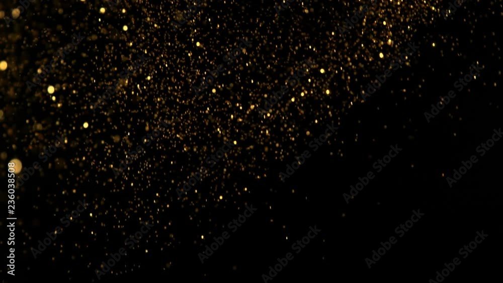 Golden glitter background in super slow motion shooted with high speed cinema camera at 1000fps 4K Golden glitter background in super slow motion shooted with high speed cinema camera at 1000fps 4K