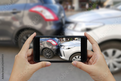 hand holding smartphone and take photo