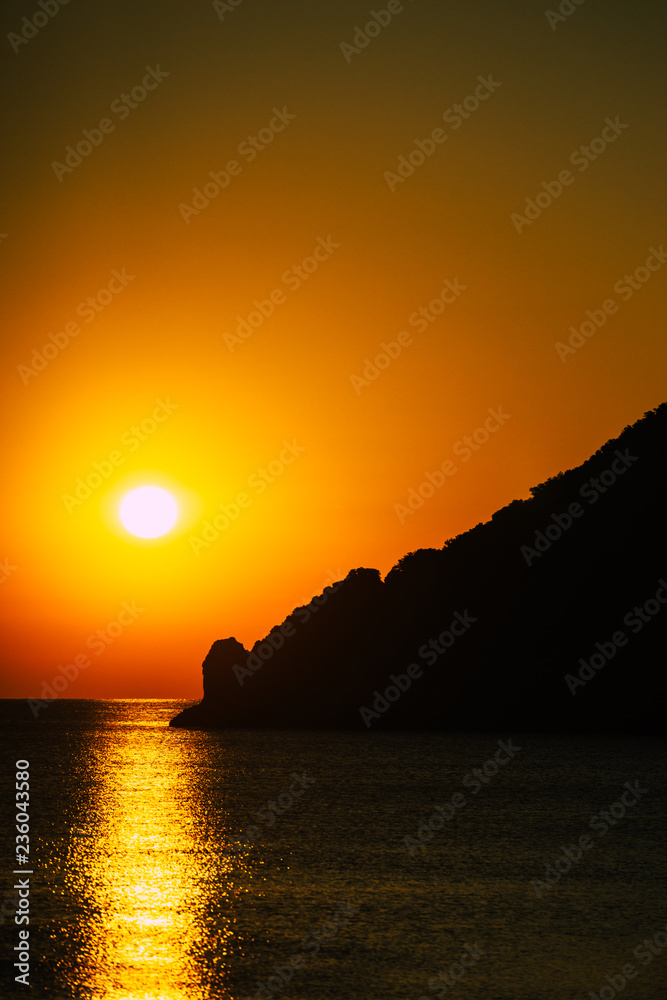 Sunset or sunrise over sea surface
