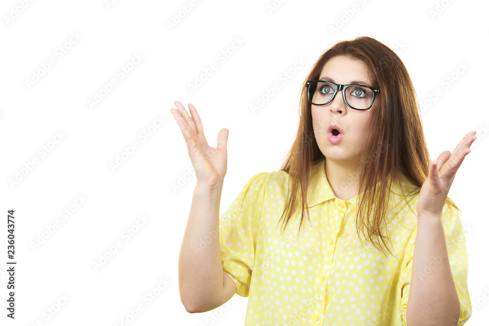 Shocked amazed woman gesturing with hands Shocked amazed woman gesturing with hands
