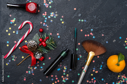Photo accessories for make-up artist, mandarin, sugar cane on black table