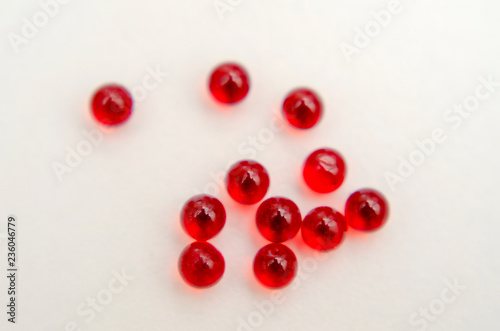 red round nitroglycerin tablets on light background