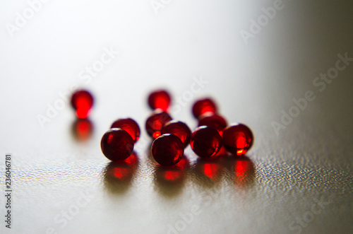 red round nitroglycerin tablets on light background