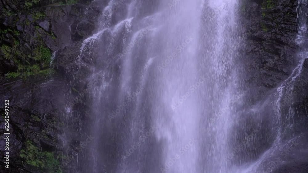 Waterfall in mountains in slow motion. Shot of a natural waterfall near Batumi, Georgia, close up Waterfall in mountains in slow motion. Shot of a natural waterfall near Batumi, Georgia, close up