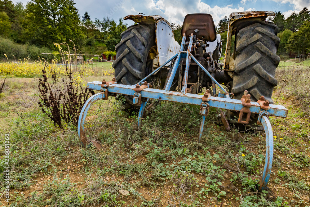 tractor and plow on the farm