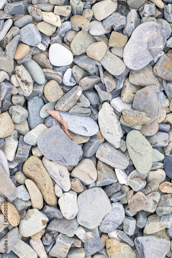 Naklejka premium Beach stone background.