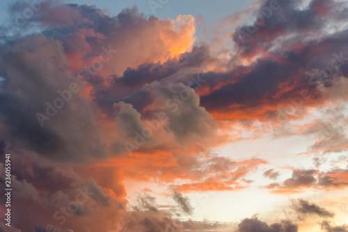 Magnificent colored clouds on the sea at sunset in the evening