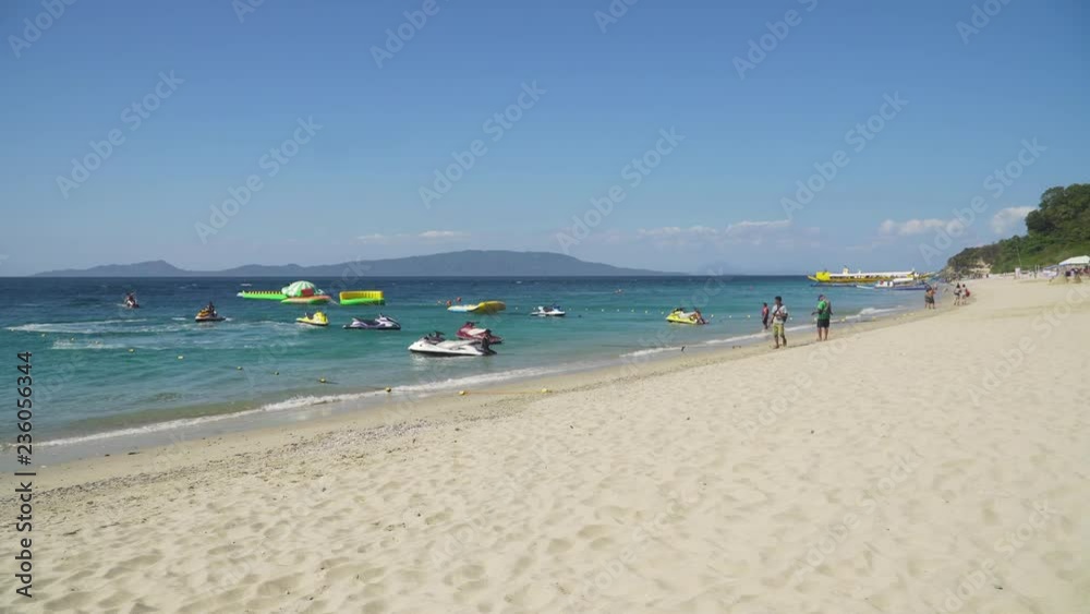 Beautiful tropical beach with white sand. White Beach, Philippines, Mindoro Beautiful tropical beach with white sand. White Beach, Philippines, Mindoro