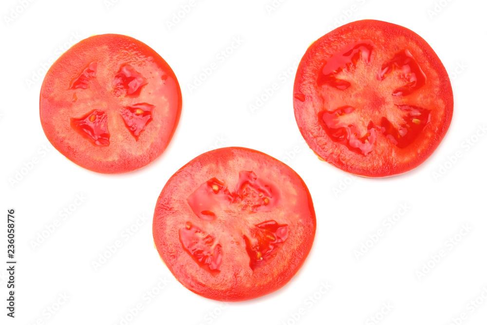 slice of tomato isolated on white background. top view slice of tomato isolated on white background. top view