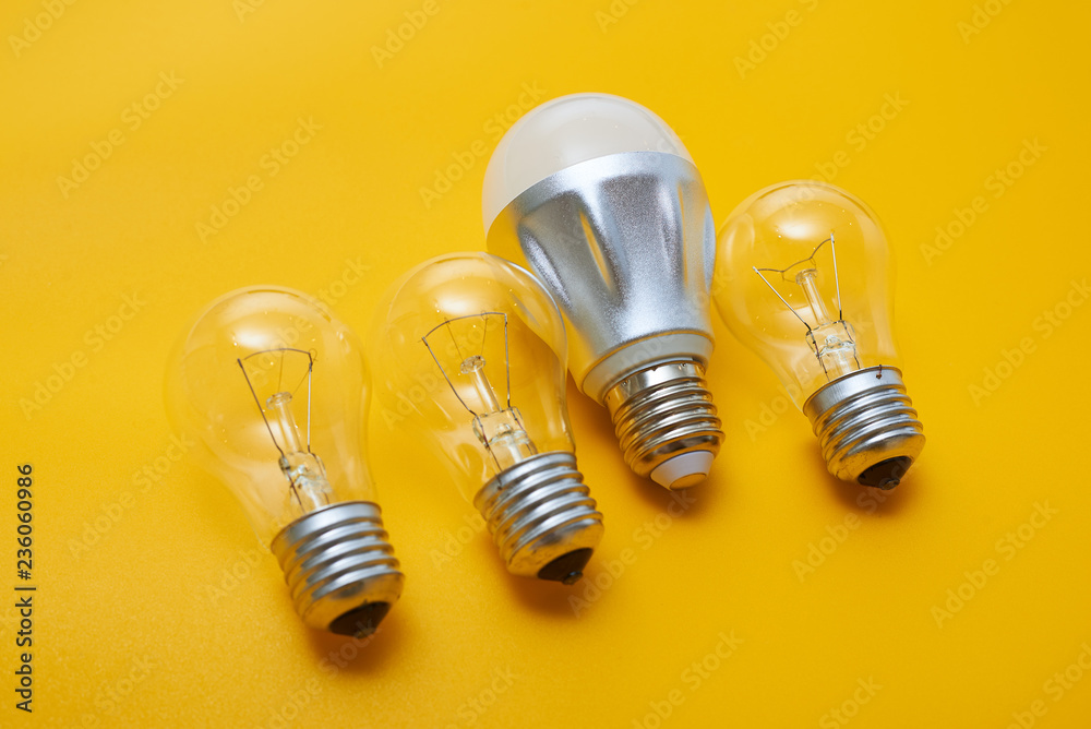 Led light bulb lay next to incandescent bulb. Concept energy saving Led light bulb lay next to incandescent bulb. Concept energy saving