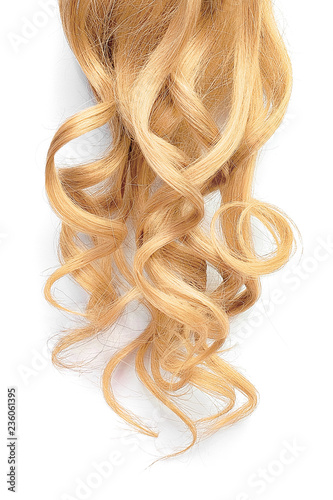 Natural wavy blond hair isolated on white background