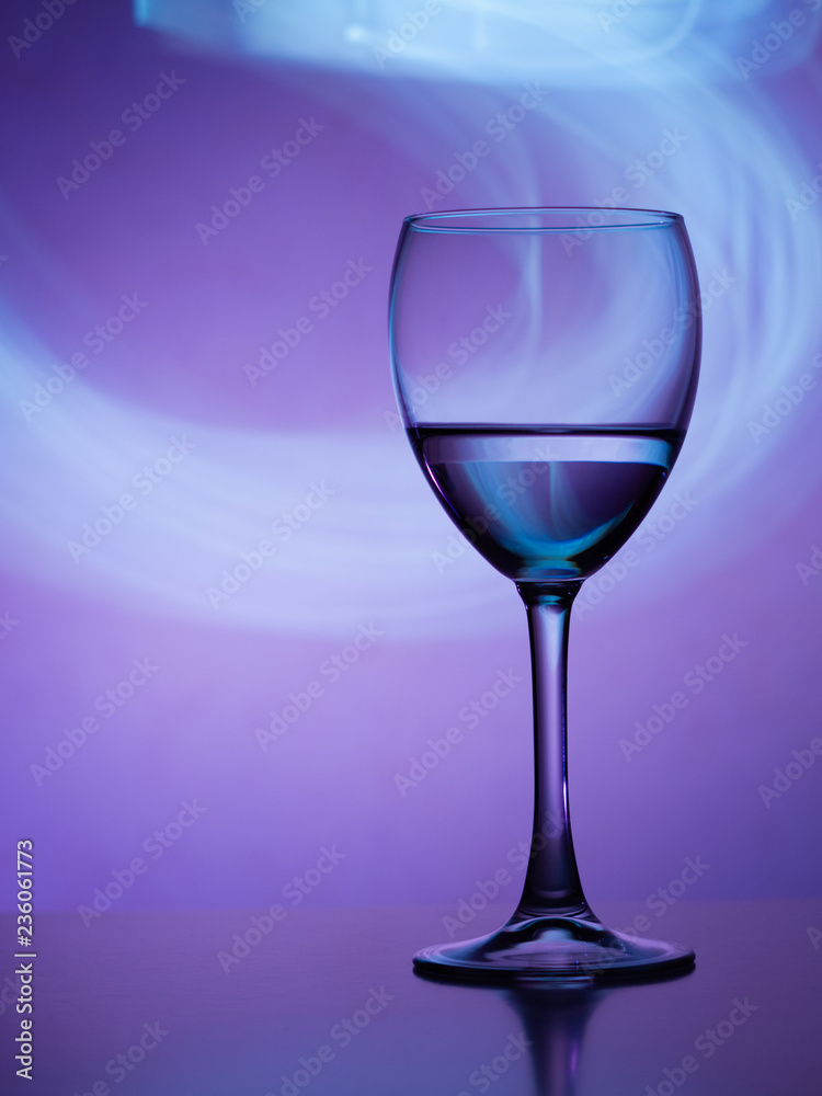 Wine glass in the club light night on weekends and holidays