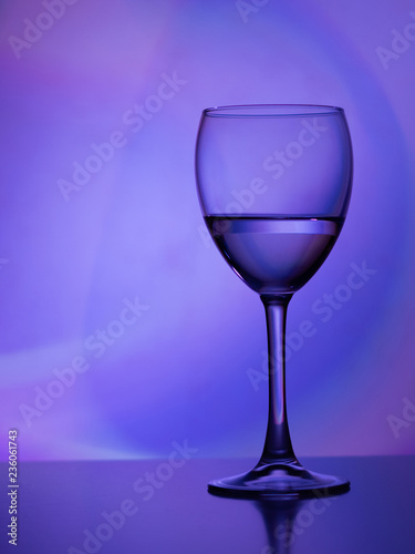 Wine glass in the club light night on weekends and holidays