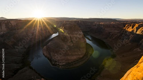 Time Lapse - Sunset at the Horseshoe bend in Arizona at a beautiful day with a view to the colorado river and sun rays