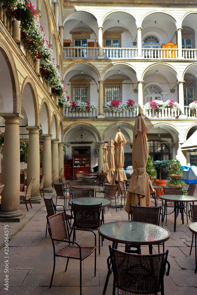 Naklejka premium View of Italian courtyard loggia arcade of the Korniakt palace (kamienica Królewska) on old town in the center of Lvov