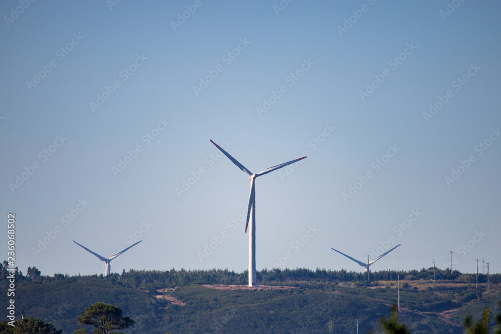 Windmills for electric power production on hill Windmills for electric power production on hill