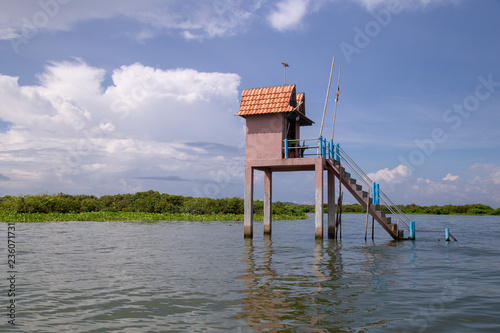 Flood Village name Kampong Phluk floating village at Tonle Sap lake, Siem Reap Province, Cambodia photo