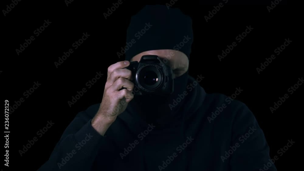 Dangerous criminal in mask making photos of kidnapping victim, demanding ransom Dangerous criminal in mask making photos of kidnapping victim, demanding ransom