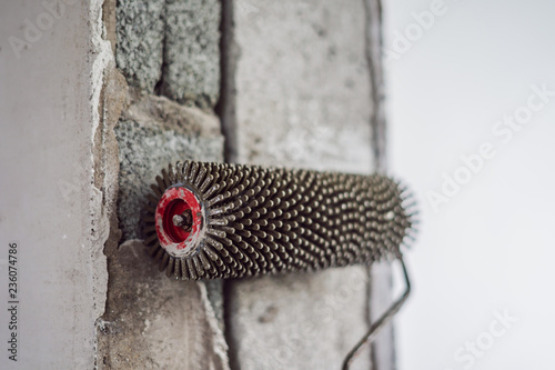 Finishing works - Needle roller for bulk floor photo