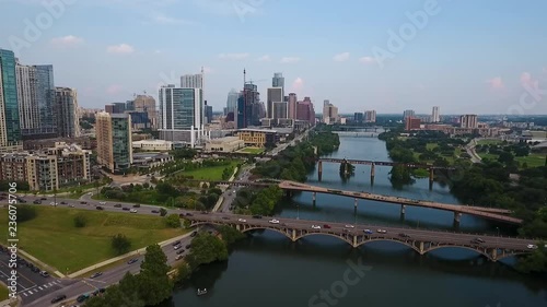 AERIAL: Pulling back from downtown Austin, Texas on a beautiful sunny day. photo
