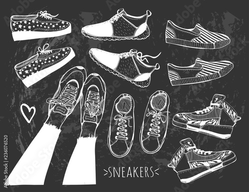 Various hand drawn sneakers and shoes. Graphic vector set. Chalkboard style. Black background. All elements are isolated photo